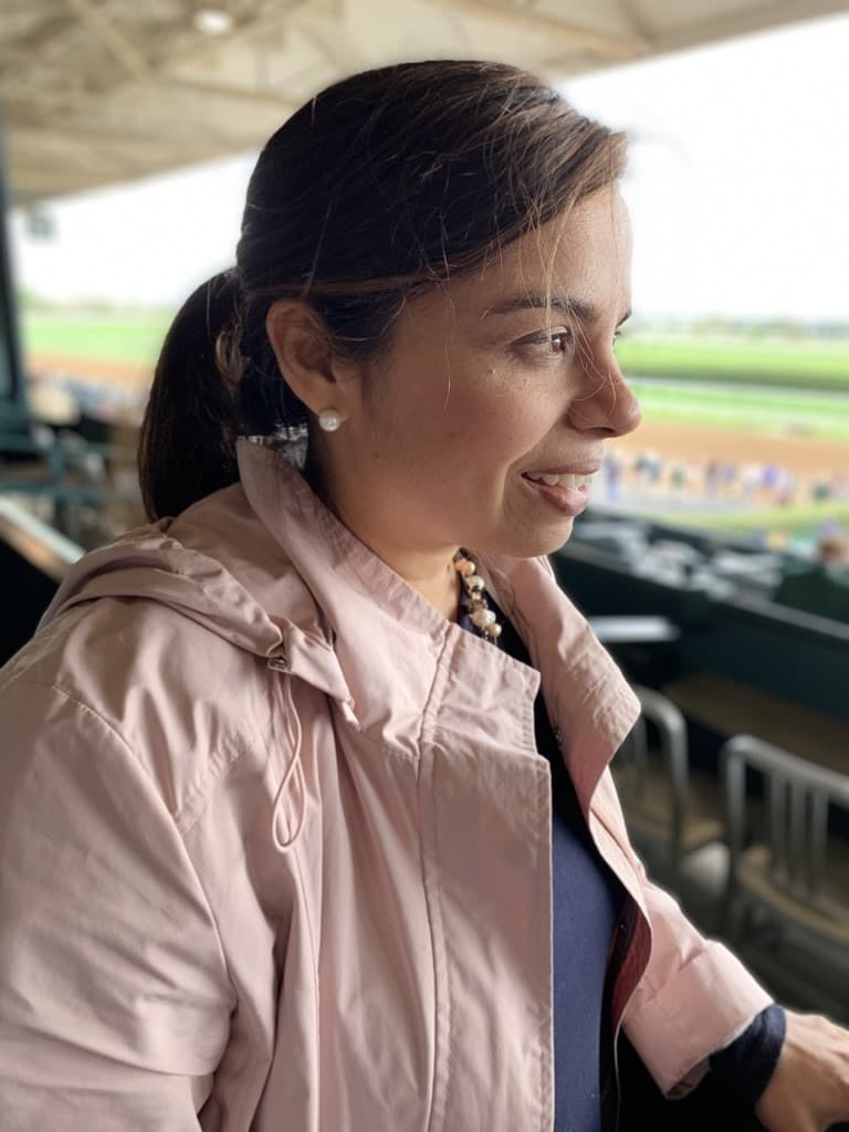 Mamata smiling at the racetrack